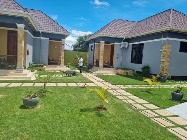 Lodge rooms set around a planted garden path